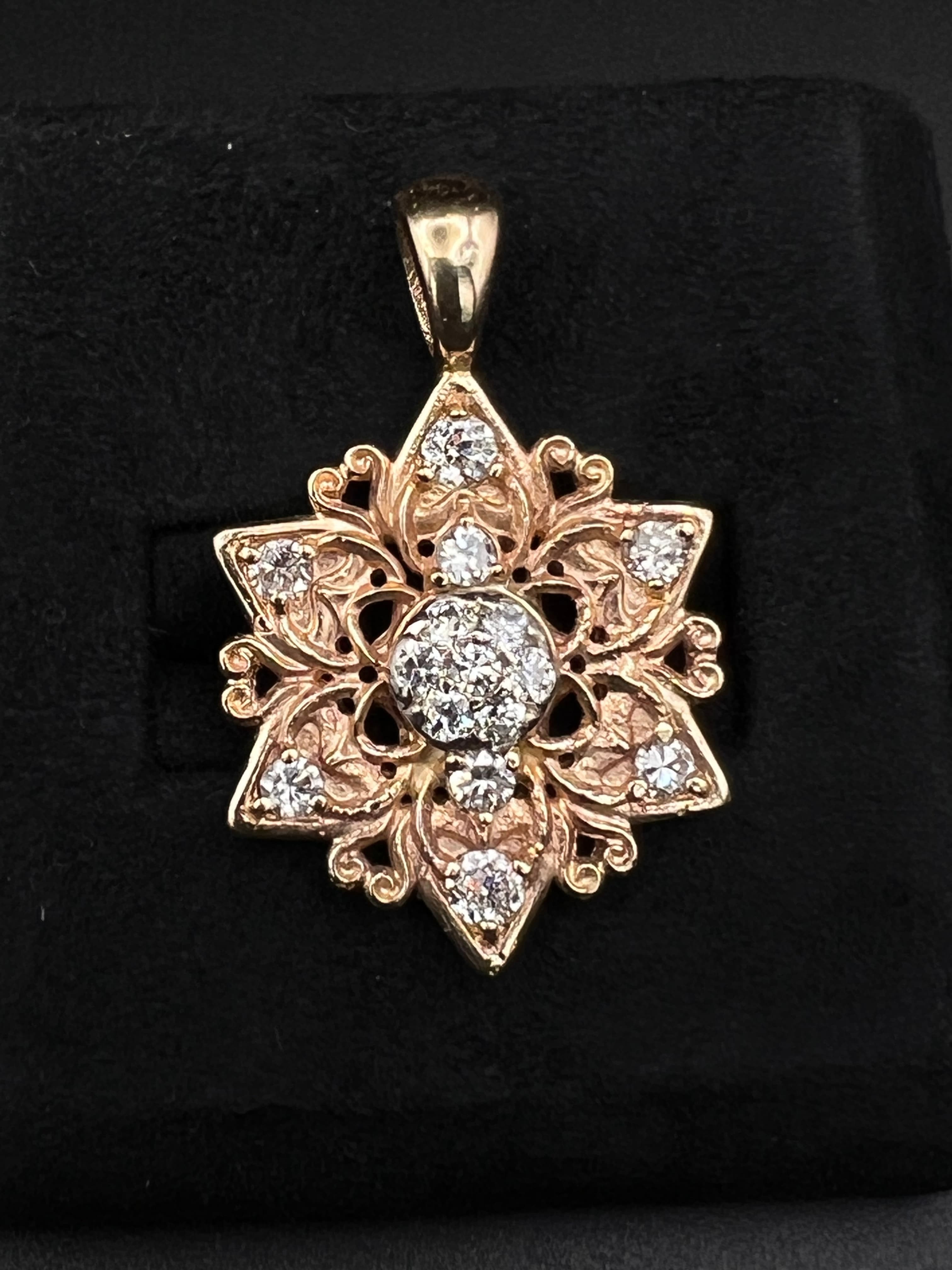 Floral star ring with diamond accents by Carroll Custom Jewelry